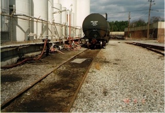 Oil Contaminated Track Siding Prior to Treatment