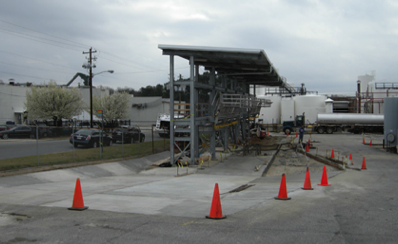 Construction of Secondary Containment Rollover Spill Containment and Clean Stormwater Pavement Diversion Transitions