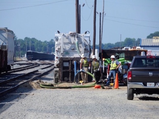 VacuJet Removal of Heavy Sludges from 24' Process Sewer at Railyard in Fulton County, Georgia