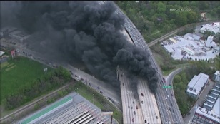 encampment fire under bridge