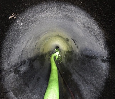 VacuJet Clears Oily Debris From 24' Pipe Macon Georgia